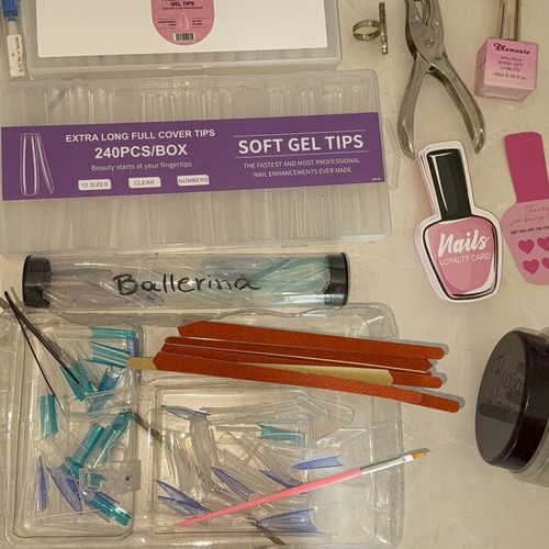 Nail products set like new with dual forms, tips, and accessories