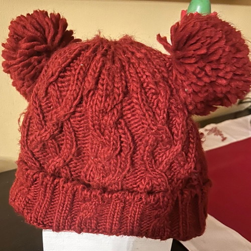Knitted hat used, burgundy Zara with two pom-poms