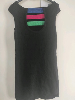 Golden Lady black mini dress medium with special back and smile neckline