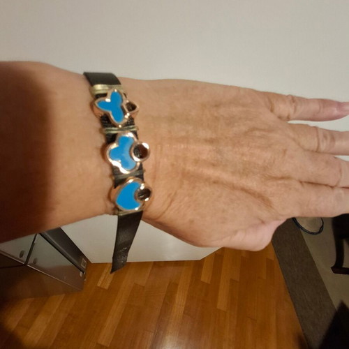 Black bracelet with blue decorations like new