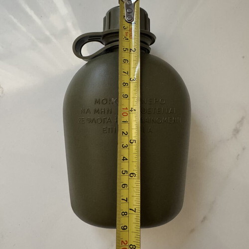 Military-style khaki water canteen with cap