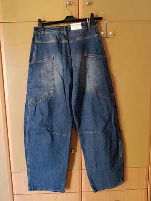 Adoro blue jeans with side pockets, new