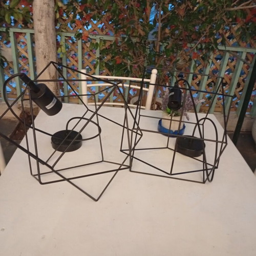 Two rhombic metal ceiling lights