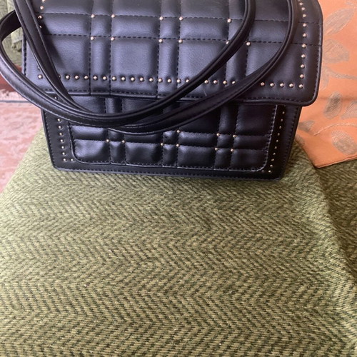 Handbag with studs like new, black with adjustable straps