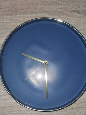 Praktiker wall clock like new, blue dial with gold hands and silver frame