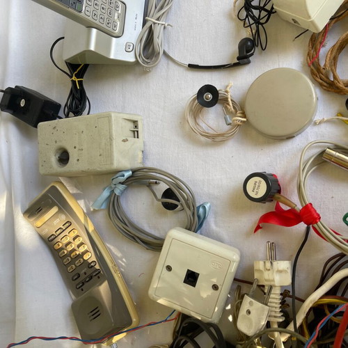Set of old cables, sockets and telephony devices used