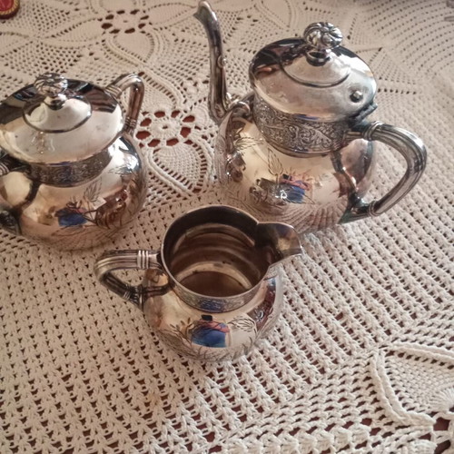 Antique silver plated teapot, sugar bowl and creamer like new