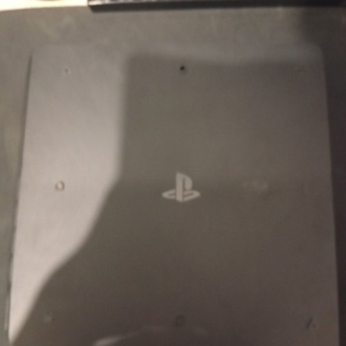 PlayStation 4 Slim 500GB like new with cable