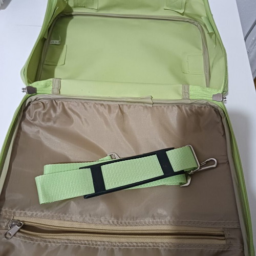 Travel toiletry bag used, green color, spacious