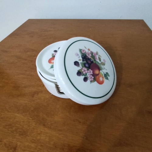Vintage bakelite coasters like new with fruit design