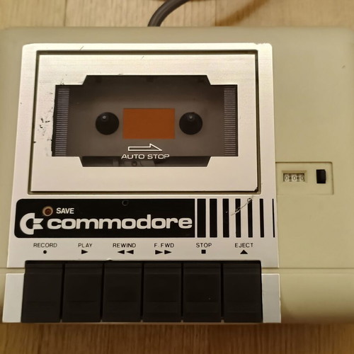 Commodore 64C used with original power supply, cassette player, and manuals