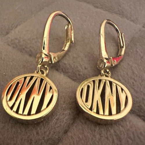 DKNY earrings like new, gold color