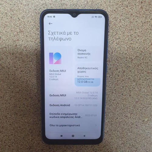 Redmi 9C smartphone with scratch-free screen, blue