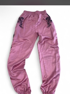 Pink sweatpants with black tiger graphic