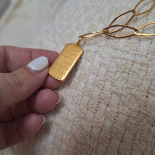 Gold-colored stainless steel necklace with extension