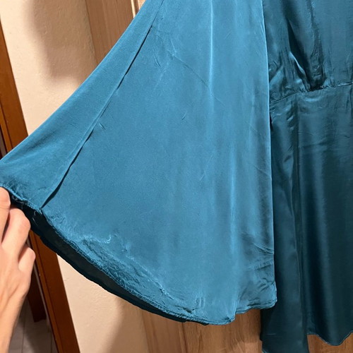 Lace dress used, size Small, with batwing sleeves and open back