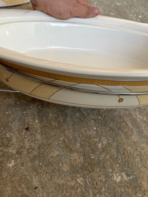 Large serving dish like new with metal base