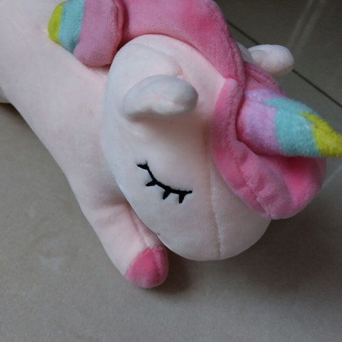 Plush unicorn in pastel colors like new