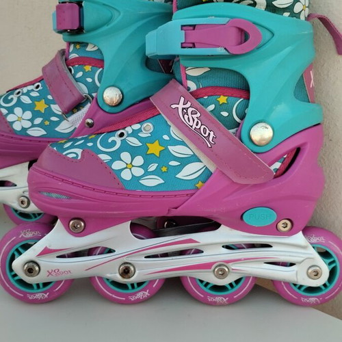 Xspot adjustable rollers size 35/37 used, turquoise pink with flowers