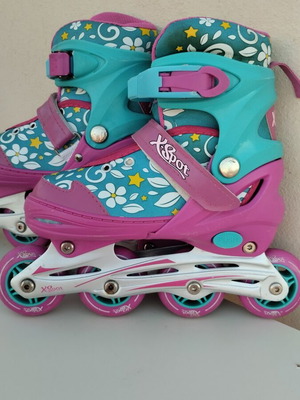 Xspot adjustable rollers size 35/37 used, turquoise pink with flowers