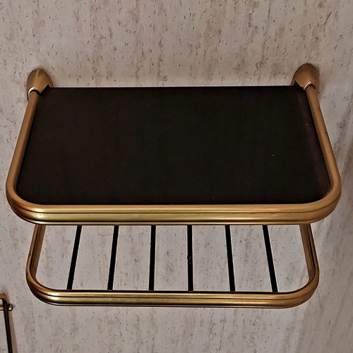 Vintage hanging wall shelf used with black glass and brass
