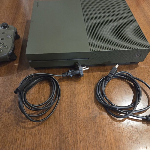 Xbox One console with preloaded paid games