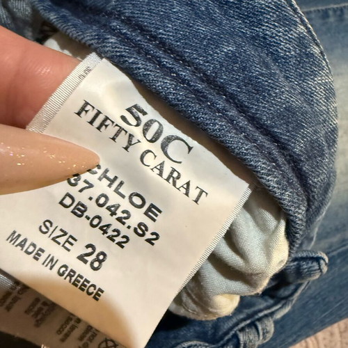 Fifty Carat jeans like new with knee rips, size 28