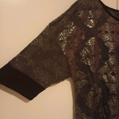Blouse with transparent details like new, black and silver