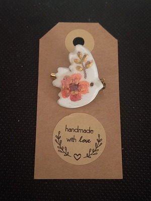 Handmade ceramic brooch new, multicolored with decoupage and glass coating