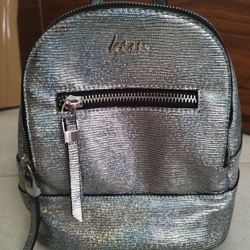 Kem backpack silver like new, metallic