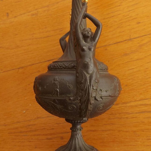 Ancient Greek hydria Empire style used with granite base and winged torchbearers