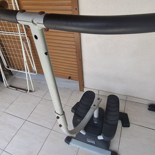 Step elliptical fitness machine used with small step counter screen