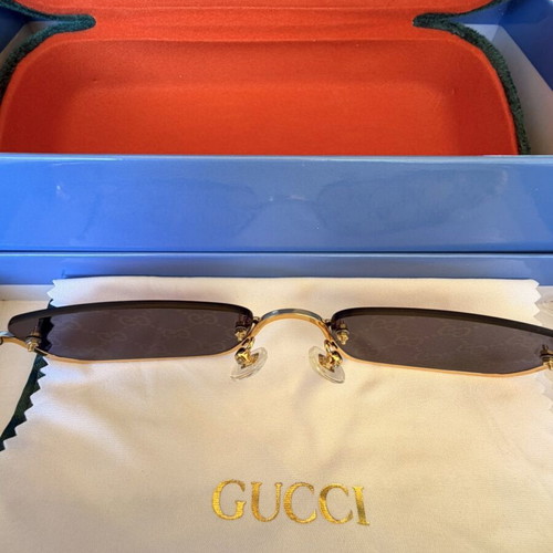 Gucci GG1278S 005 Sunglasses new, gold frame purple mirror