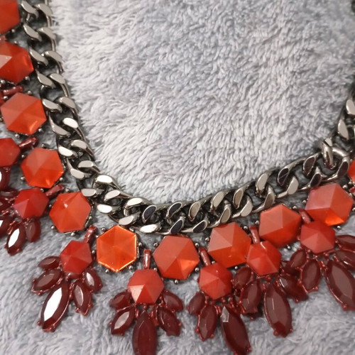 Statement necklace made of steel with red and burgundy stones new