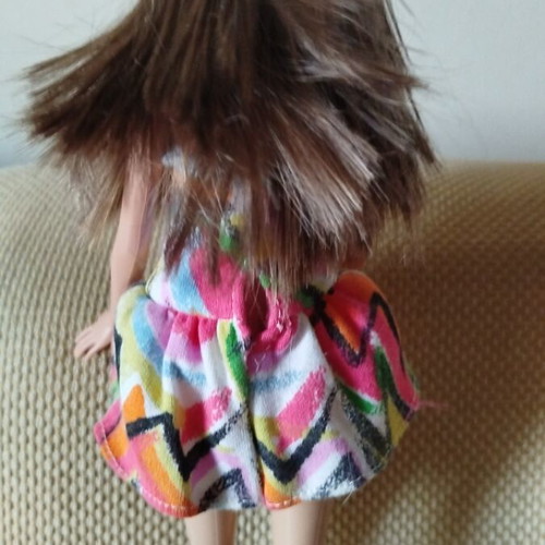 Barbie Fashionistas doll like new with colorful geometric dress and orange boots
