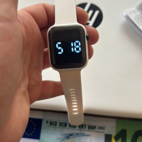 Electronic wristwatch new, white, analog