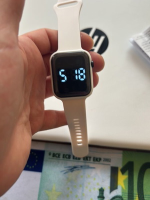 Electronic wristwatch new, white, analog