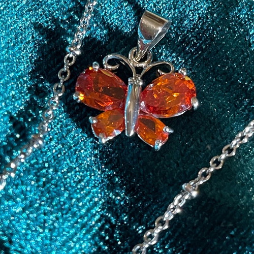 Necklace with orange butterfly pendant like new