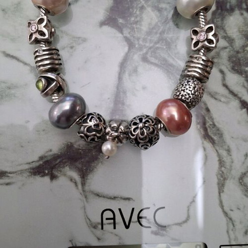 Pandora silver bracelet new with 13 charms