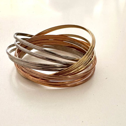 Infinity bracelet like new with mixed gold and silver tones