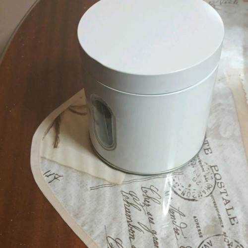 Metal vase with window