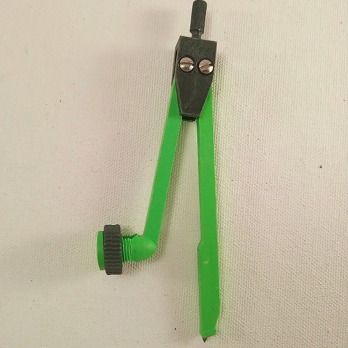 Plastic compass that holds pencil, pen etc, new