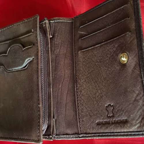 Brown leather wallet used with multiple compartments