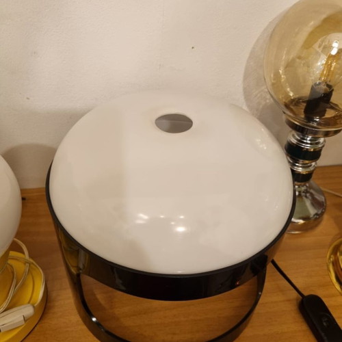 Lamp model KD 27 used, designed by Joe Colombo