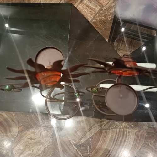 Decorative candle holders set of two used, wrought iron sun design