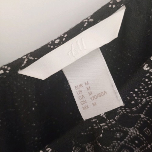 H&M one-piece shorts like new, black and white, size Medium