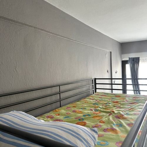 Bunk bed with desk and mattress