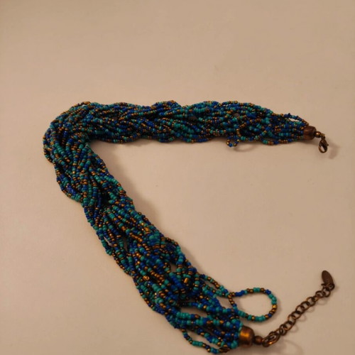 Statement necklace like new with blue and gold braided seed beads