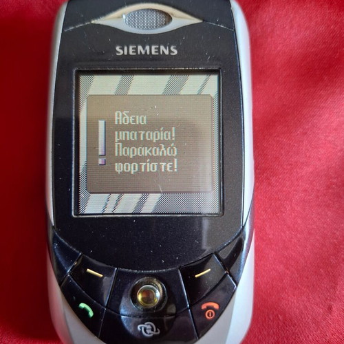 Siemens SL65 Ebony collectible cell phone used with packaging and accessories