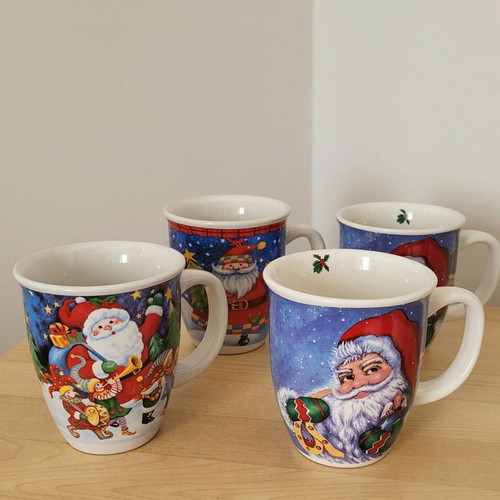 Set of 7 used Christmas mugs in two sizes